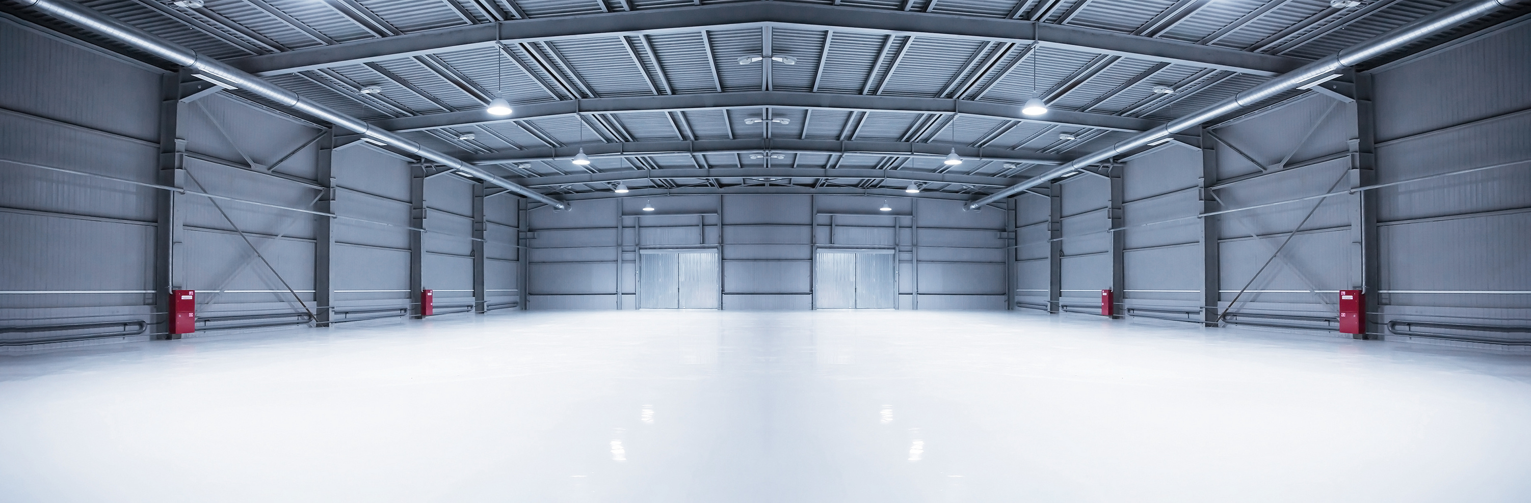 Panorama of Empty Room of Modern Storehouse with Gates and Self-Leveling Floor